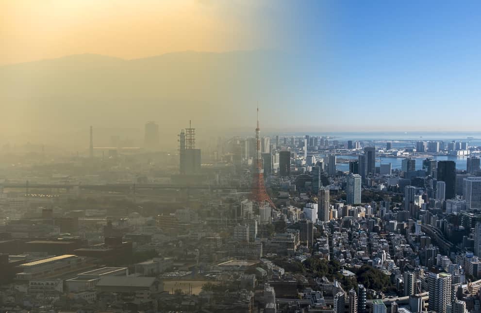 Photo illustration with left half of city skyline polluted and gradual improvement toward blue sky at right
